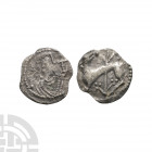 Secondary Phase - Series K, Type 42 - Hound AR Sceatta. 710-760 A.D. Variety C. Obv: diademed profile bust right with flower before. Rev: hound left w...