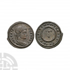 Crispus - Wreath Bronze. 320-321 A.D. Siscia mint. Obv: IVL CRISPVS NOB C legend with laureate bust right. Rev: CAESARVM NOSTRORVM legend with VOT / X...