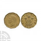 George VI - 1946 - Brass Threepence. Dated 1946 A.D. First issue. Obv: profile bust with GEORGIVS VI D G BR OMN REX F D IND IMP legend. Rev: thrift pl...