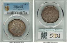 George IV 1/2 Crown 1820 AU58 PCGS, KM676, S-3807. First year of three year type. Pearl-gray tone with a blue cast and sunset orange accent. 

HID0980...