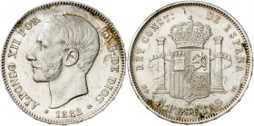 1882/1*1881. Alfonso XII. MSM. 5 pesetas. (AC. 45). Golpecito. Escasa. 24,88 g. MBC-.