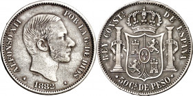 1882. Alfonso XII. Manila. 50 centavos. (AC. 118). Rayitas. 12,73 g. MBC/MBC+.