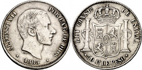 1883. Alfonso XII. Manila. 50 centavos. (AC. 120). Rayitas. 12,36 g. MBC-/MBC.