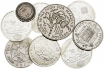 Lote de 3 monedas de Franco (1, 5 y 100 pesetas), 5 de Juan Carlos I (2000 pesetas) y 4 dólares de San Cristóbal-Nevis-Anguilla. Total 9 monedas. A ex...