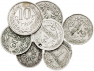 Uruguay. 1901 a 1953. 1 (tres), 2 (tres), 5 y 10 céntimos. Lote de 8 monedas, una con perforación. CU-NI. BC+/MBC+.
