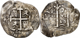 1669. Carlos II. Potosí. E. 2 reales. (AC. 386). Doble fecha, la del anverso de tres dígitos. 4,89 g. MBC.