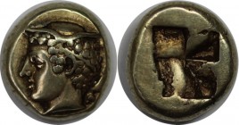 Griechische Münzen, IONIA, Phokaia EL Hekte Circa 450-400 BC. Head of Hermes left, wearing winged petasos, behind neck seal swimming downward / Irregu...