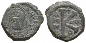 Byzantine
Justinian I. AD 527-565. AE Half Follis.

Weight: 10,9 gr
Diameter: 29,5 mm
