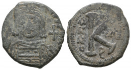 Byzantine
Justinian I. AD 527-565. AE Half Follis.

Weight: 11,9 gr
Diameter: 30,5 mm
