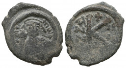 TIBERIUS II CONSTANTINE. 578-582 AD. Æ Half Follis

Weight: 3,7 gr
Diameter: 15,6 mm