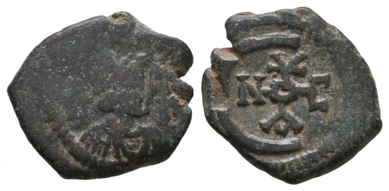 Byzantine
Justinian I. AD 527-565. Pentanummium Æ

Weight: 14,6 gr
Diameter:...
