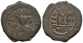 TIBERIUS II CONSTANTINE. 578-582 AD. Æ Follis. Nicomedia mint.

Weight: 11,3 gr
Diameter: 30,9 mm