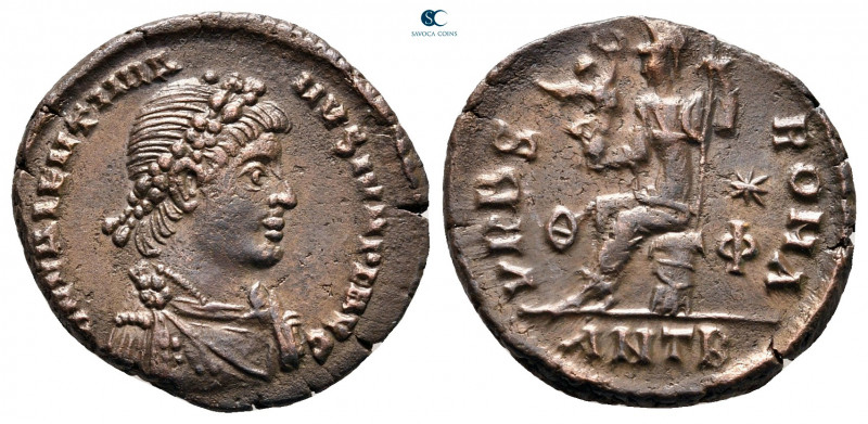 Valentinian II AD 375-392. Antioch
Follis Æ

19 mm, 2,88 g

D N VALENTINIAN...