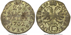 Lübeck. Free City 1/24 Taler 1702 MS62 NGC, KM-A79. The finest and only certified example of this date with attractively patinated surfaces and Mint S...