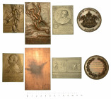 ITALIA. Lotto di una medaglia e tre placchette in bronzo e metallo bianco.