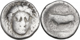 Greek Italy. Central and Southern Campania, Phistelia. AR Nomos, c. 400-390 BC. Obv. Female facing head right. Rev. Man-headed bull standing left; [in...