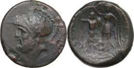 Greek Italy. Bruttium, Brettii. AE Double unit, c. 214-211 BC. Obv. Helmeted head of Ares left; two pellets behind. Rev. Nike standing left, holding p...