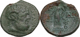 Sicily. Katane. AE 21 mm, c. 186-170 BC. Obv. Laureate head of Zeus-Ammon right. Rev. Dikaiosyne standing left, holding scales and cornucopia; monogra...