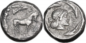 Sicily. Syracuse. Hieron I (478-466 BC). AR Tetradrachm, c. 475-470 BC. Obv. Charioteer driving quadriga right; above, Nike flying right, crowning hor...