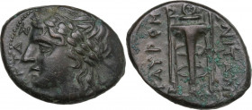 Sicily. Tauromenion. Roman Rule. AE 24mm, after 216 BC. Obv. Head of Apollo left, laureate, bee to right. Rev. Tripod. HGC 2 1582; CNS III 25. AE. 5.5...