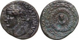 Tiberius (14-37). AE Dupondius. Struck circa AD 16-22. Obv. Laureate head left. Rev. Small, bareheaded bust of Tiberius facing, in center of round med...