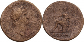 Nero (54-68). AE Sestertius, 62-68. Obv. Laureate head right. Rev. Roma seated left on cuirass, holding Victory and resting elbow on parazonium; behin...