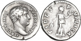 Hadrian (117-138). AR Denarius, 136 AD. Obv. Head right. Rev. Fides standing right, holding corn-ears and bowl of fruits. RIC II-p. 3 (2nd ed.) 2200. ...