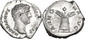 Hadrian (117-138). AR Denarius, struck AD 137-July 138. Obv. Bare head right. Rev. Modius, with poppy between four stalks of grain–two left and two ri...