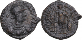 Ostrogothic Italy, Athalaric (526-534). AE Decanummium. Rome mint. Obv. Helmeted and cuirassed bust of Roma right. Rev. Athalaric standing facing, hol...