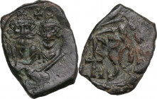 Heraclius, with Heraclius Constantine (610-641). AE Follis, Syracuse mint, 632-641-. Obv. Busts of Heraclius and Heraclius Constantine facing, crowned...
