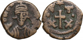 Constans II (641-668). AE Half Follis, Carthage mint. Obv. Bust facing, wearing consular robes and crown with trefoil ornament, holding mappa and glob...