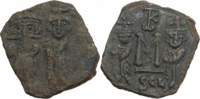 Constans II, with Constantine IV, Heraclius, and Tiberius (641-668). AE Follis, Syracuse mint, 659-668. Obv. Obv. Constans, bearded and holding long c...