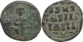 Constantine IX Monomachus (1042-1055). AE Follis, Constantinople mint, 1042-1055. Obv. Christ Pantokrator enthroned, cross-nimbate; right hand raised ...