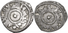 Fatimids. Al Mu'izz (341-365 AH/ 935-975 DC). AR 1/16 Dirham or Kharruba, (Siqiliiya). D/ Kalima around central pellet. R/ Name and title around centr...