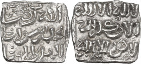 Muwahhiduns (Almohad). Anonymous. AR Dirham with symbols. D/ Kalima and almohad motto in three lines; symbols below. R/ Continuation of almohad motto ...