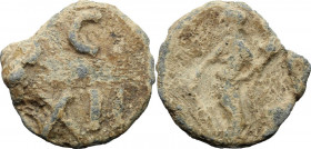 Leads from Ancient World. PB Tessera, c. 1st century AD. Obv. C / XII. Rev. Fortuna standing left, holding rudder and cornucopiae. Rostowzew 252. PB. ...