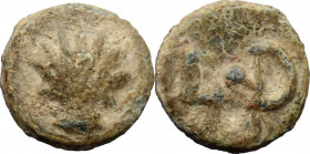 Leads from Ancient World. PB Tessera, c. 1st century AD. Obv. Shell. Rev. L D. PB. 0.84 g. 10.00 mm. VF.
