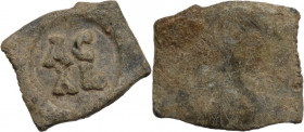 Leads from Ancient World. PB Tessera, 3rd-4th century AD. Obv. AC / AL. Rev. Blank. cf. London Ancient Coins Ltd. Auction 60/402. PB. 5.70 g. 23.00 mm...