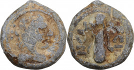 Leads from Ancient World. PB Object, with obverse features of Republican AE Quadrans. On reverse: N.CAL/ ECI. PB. 41.70 g. 30.00 mm. Interesting, for ...