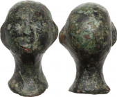 Bronze steelyard weight in the form of a wrestler's head. Roman, 1st-3rd century AD. 18 mm. 8.45 g.