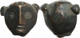 Bronze decorative geometric element (or weight ?) in the shape of a head. Roman (?). 12 x 12 m. 3 g.