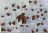 Collection of 38 'Terra Sigillata' fragments. Roman, 1st-3rd century AD. With collector's labels.
