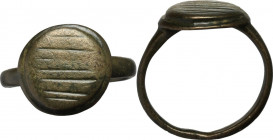 Bronze ring, the bezel decorated with lines. Middle ages. Size 16.7 mm.
