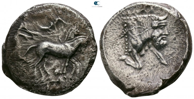 Sicily. Gela circa 450-440 BC. 
Tetradrachm AR

24mm., 17,26g.

Charioteer,...