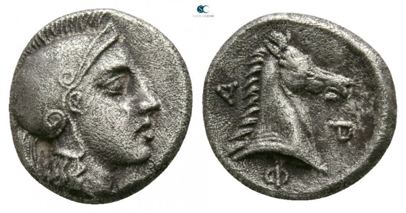 Thessaly. Pharsalos circa 450-420 BC. 
Obol AR

8mm., 0,98g.

Helmeted head...
