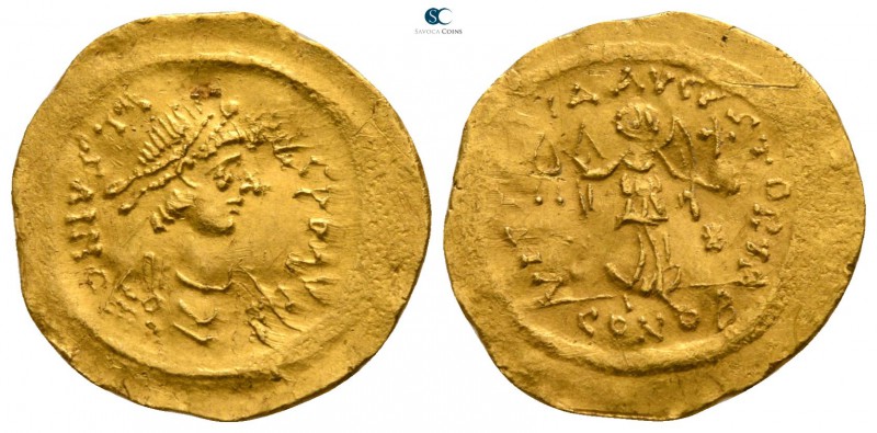 Justin I AD 518-527. Constantinople
Tremissis AV

15mm., 1,49g.

D N IVSTI-...