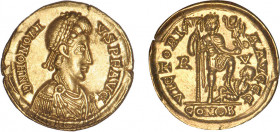 HONORIUS (393-423)
Solidus : Honorius en habit militaire debout à droite tenant un étandard & une Victoire sur un globe - son pied gauche sur un capt...