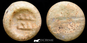 Fatimi Glass Weight 1.53 g., 17 mm. Egypt 1036-1094 A.D. - 427-487h. Very fine