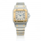 CARTIER Santos Referenza 166930. Cal. 66 al quarzo. Numero di serie 06XXX. Cassa in acciaio 24x35mm. Lunetta in oro. Corona da 4,4mm con pietra blu a ...