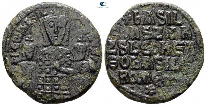 Basil I, with Leo VI and Constantine VII AD 867-886. Constantinople
Follis Æ
...